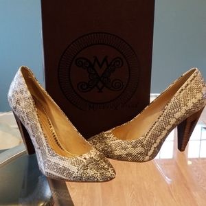 Cream snake skin shoes